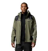 Campera impermeable Columbia modelo Whistler Peak Shell Outdry, de color verde militar con inserciones negras en hombros y codos. Cuenta con capucha ajustable, cierre frontal y bolsillos con cremalleras selladas, y tecnología OutDry Extreme.