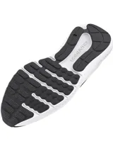 Championes de running Under Armour Charged Surge 4, color negro con logo blanco y suela blanca.