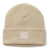 Gorro tipo beanie de tejido grueso color beige, con diseño de punto acanalado y vuelta en el borde. Presenta un parche cuadrado en el frente con el logo de la marca Columbia.
