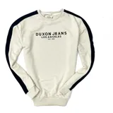 Buzo color beige con mangas largas y cuello redondo. Presenta una banda azul marino a lo largo de las mangas y un estampado frontal con la leyenda "Duxon Jeans Los Angeles Est 1982".