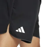 Shorts de tenis Adidas de la colección Club, color negro con logo blanco en la pierna izquierda. Confeccionados con tejido Climacool que repele el sudor y mantiene fresco y seco. Incluyen bolsillos frontales para guardar pelotas de tenis.