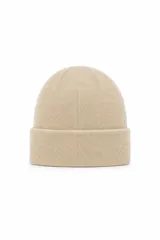 Gorro tipo beanie de tejido de punto suave con vuelta en el borde.