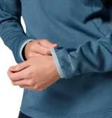 Buzo polar Columbia de mujer con cierre frontal parcial, cuello alto y bolsillo con cierre en el pecho. Presenta un diseño técnico con tecnología Omni-Wick para absorción de humedad y ribetes en contraste en cuello y puños.