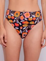 Conjunto de bikini con corpiño triangular con breteles finos y bombacha de tiro alto. Estampado multicolor con motivos florales y geométricos.