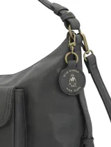 Cartera hobo Hush Puppies modelo Dover, color gris oscuro, con bolsillo frontal con solapa y cierre superior. Cuenta con asa corta para llevar al hombro y correa larga ajustable.