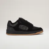 Zapatillas Airwalk modelo Throlle, color negro con suela de goma marrón, confeccionadas en cuero sintético y gamuza, con cordones anchos y detalle de logo en el lateral.