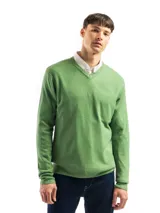 Buzo tejido de punto con cuello en V, de calce regular y mangas largas con puños acanalados.