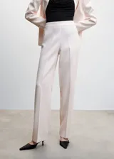 Pantalon de vestir de corte recto y tejido fluido, con cintura elástica y diseño minimalista.