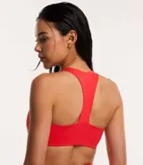 Short deportivo verde oscuro, modelo runner, con cintura elástica y pequeño bolsillo interior.