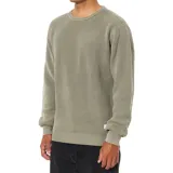 Buzo de tejido de punto grueso con cuello redondo, mangas largas y puños acanalados. Presenta un diseño de textura acanalada vertical y un pequeño detalle de etiqueta en el lateral inferior.