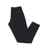 Pantalón de vestir azul marino, de corte ajustado, con bolsillos laterales y traseros.