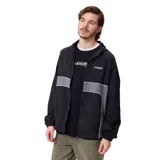 Campera rompevientos Rusty modelo Pipper, color negro con paneles laterales y frontales en gris. Cuenta con cierre frontal, puños elásticos y logo de la marca en el pecho.