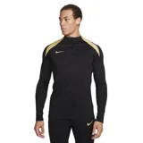 Camiseta de entrenamiento Nike Strike de manga larga, color negro con detalles en amarillo en los hombros y cuello alto con cierre frontal parcial. Cuenta con el logo de la marca bordado en el pecho.