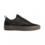 Championes Vans modelo Skate Old Skool con tecnología Wafflecup, color negro con detalles en marrón oscuro. Presentan una combinación de materiales en la capellada, incluyendo gamuza y tela técnica, con la clásica banda lateral de la marca y suela de goma reforzada.