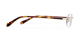 Lentes Blue Light con montura ovalada de acero inoxidable color oro y patillas de acetato con estampado carey. Cuentan con protección UV400 y filtro de luz azul. Diseñados para un perfecto equilibrio entre comodidad y durabilidad.