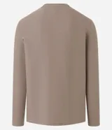 Remera de manga larga con cuello redondo y textura acanalada, confeccionada en una mezcla de poliéster y algodón.