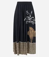 Pollera midi evasê de Marfinno, color negro, con cintura elástica y caída fluida. Presenta estampado de follaje en tonos blancos y marrones, y un diseño geométrico en el bajo.