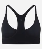 Top deportivo de microfibra color verde militar, con escote redondo, copas incorporadas y espalda nadadora. Marca Get Over.