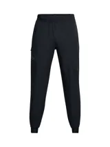 Joggers deportivos Under Armour modelo Unstoppable, confeccionados en tejido técnico elástico con tecnología UA Storm repelente al agua. Presentan corte ajustado en las piernas, cintura elástica con cordón interno, bragueta funcional con cierre a presión, bolsillos laterales y bolsillo trasero con cremallera sellada.