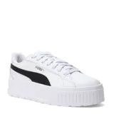 Championes urbanos Puma modelo Karmen II L, color blanco con detalle de franja lateral en negro. Presentan una suela de plataforma alta con diseño estriado y cierre mediante cordones.