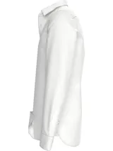 Camisa blanca de corte regular Tommy Hilfiger, confeccionada en algodón dobby Oxford. Tiene cuello con botones, cierre con botones, puños redondeados con dos botones, botón final a contraste y logo de Tommy Hilfiger bordado en el pecho.