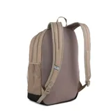 Mochila Puma modelo Buzz Backpack color marrón claro con base negra. Cuenta con dos compartimentos principales con cierre, un bolsillo frontal con cierre, bolsillos laterales de red y correas ajustables acolchadas. Incluye el logo de la marca en relieve en el frente.