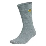 Medias Adidas Gonz Art Sock de color verde jaspeado, con logo bordado en amarillo y verde en la parte superior del tobillo.