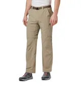 Pantalón convertible de trekking color beige, con diseño desmontable que permite transformarlo en short. Cuenta con múltiples bolsillos, incluyendo bolsillos laterales con cierre, y cintura con cinturón integrado.