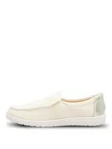 Slip on de diseño casual en color beige, confeccionado en material textil con suela de EVA flexible y liviana.
