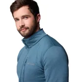 Campera de forro polar Columbia para hombre, con cierre frontal completo, cuello alto y bolsillo vertical en el pecho con cierre. Confeccionada en tejido hidroabsorbente con textura de rejilla.