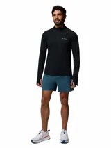Buzo de media cremallera Columbia Polar Stealth Spring Ls Hz Omni-Shade color negro, de manga larga con orificios para los pulgares en los puños.