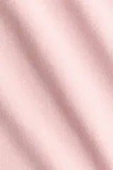 Pantalón de felpa liviana de mezcla de algodón, color rosado pálido. Modelo de corte relajado con cintura elástica fruncida y piernas rectas.