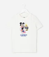 Remera crop de manga corta color blanco hueso, confeccionada en algodón con elastano. Presenta un estampado frontal de Minnie Mouse con gafas de sol, patines y un boombox, con la frase "La ratoncita quiere bailar".