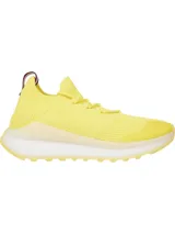 Zapatillas de running Tommy Hilfiger color amarillo, confeccionadas en tejido de punto elástico de poliéster reciclado, con cordones, suela dentada y plantilla de acupresión.