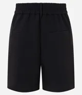 Short de tiro alto confeccionado en crepé de poliéster y elastano, de marca Cortelle. Presenta diseño sastrero con bolsillos delanteros aplicados, presillas para cinturón y cierre delantero.