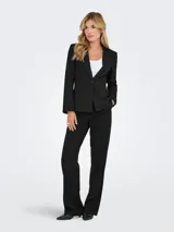 Pantalón sastrero negro de tiro alto con diseño de corte recto y trabillas para cinturón.