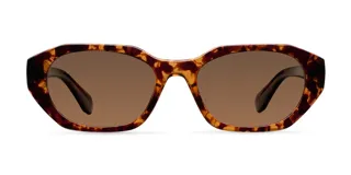 Lentes de sol con montura geométrica heptagonal y efecto carey en tonos marrones, con cristales polarizados color marrón.