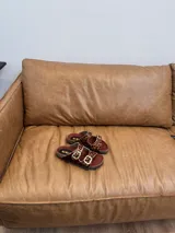 Sandalias de cuero con estampado animal print, suela birkin y plantilla de cuero.