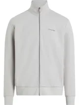 Buzo de cuello alto con cierre frontal completo, confeccionado en una mezcla de algodón y poliéster. Presenta un diseño minimalista con logo de Calvin Klein en el pecho, puños y bajo acanalados, y bolsillos laterales.