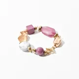 Pulsera con cuentas de diferentes formas y colores: dorado, lila, rosa y blanco marmolado.
