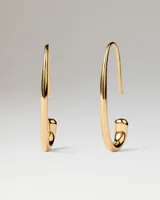 Aros Eira Pdpaola de diseño abierto y alargado con forma orgánica y acabado dorado.