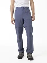 Pantalón Merrell desmontable de trekking color gris, de corte recto y tiro medio, confeccionado con tejido elástico de poliéster y spandex. Incluye cinturón ajustable, bolsillos laterales con cierre y logo reflectante.