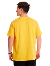 Remera unisex de manga corta y cuello redondo, de color amarillo, con el logo de la marca CAT impreso en negro en el centro del pecho.