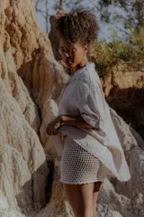 Camisa color naranja de lino 100%, de corte holgado y mangas 3/4.