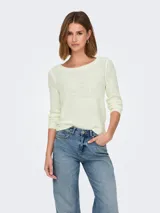Sweater de punto con cuello redondo y manga larga, de corte regular y textura suave.