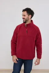 Sweater azul de polar con cuello alto y cierre parcial con cremallera.