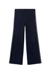 Pantalón de punto color azul marino, de corte recto y tiro alto, con ribetes blancos en los laterales.