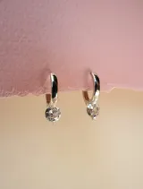 Aros tipo argolla de plata 925 bañados en oro 18K con circonia grande colgante.