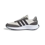 Championes Adidas Run 70s de estilo retro, con diseño inspirado en el running de los años 70. Presentan una combinación de colores beige y gris oscuro, con las icónicas tres franjas laterales en contraste, suela blanca gruesa y detalles en gamuza.