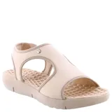 Sandalias de diseño ergonómico en color beige, con capellada de elástico y suela de goma texturizada con plantilla anatómica.
